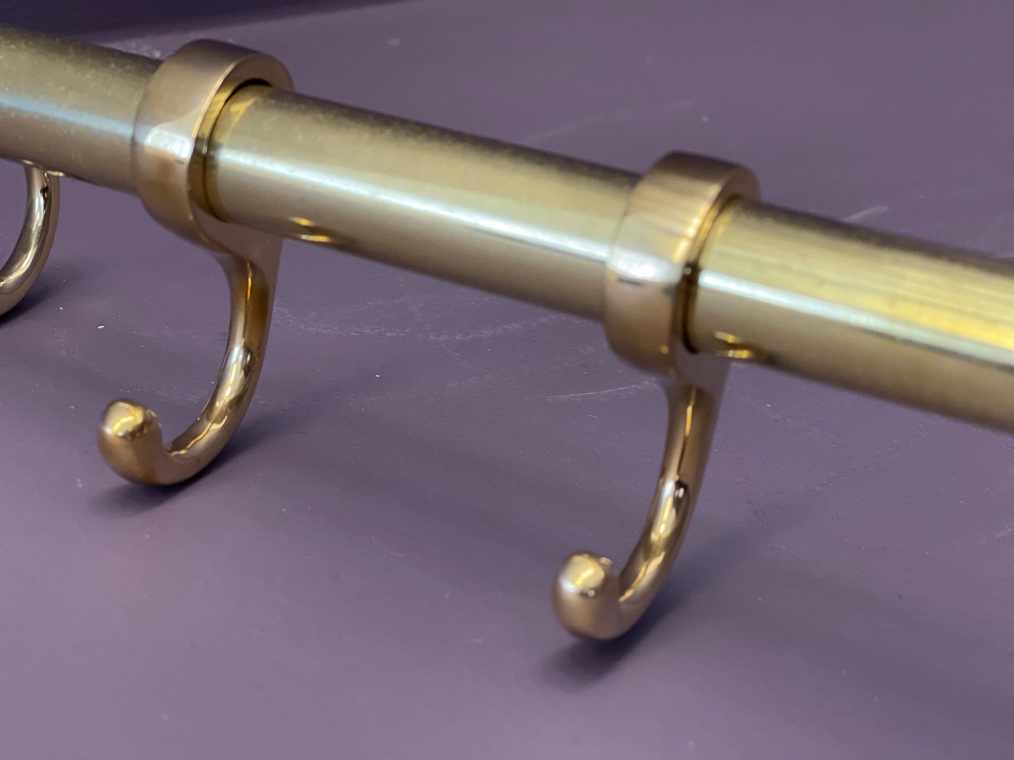 Solid brass rail fitting close-up