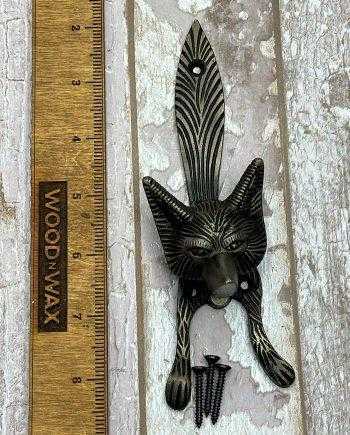 Iron knocker with fox relief with ruler for scale